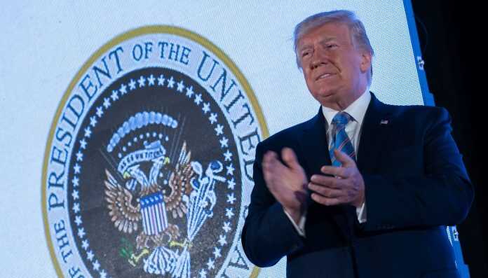 donald-trump-clapping-smiling-e1574437541938